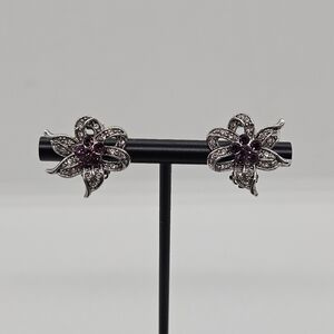 silver tone and purple rhinestone flower clip earrings